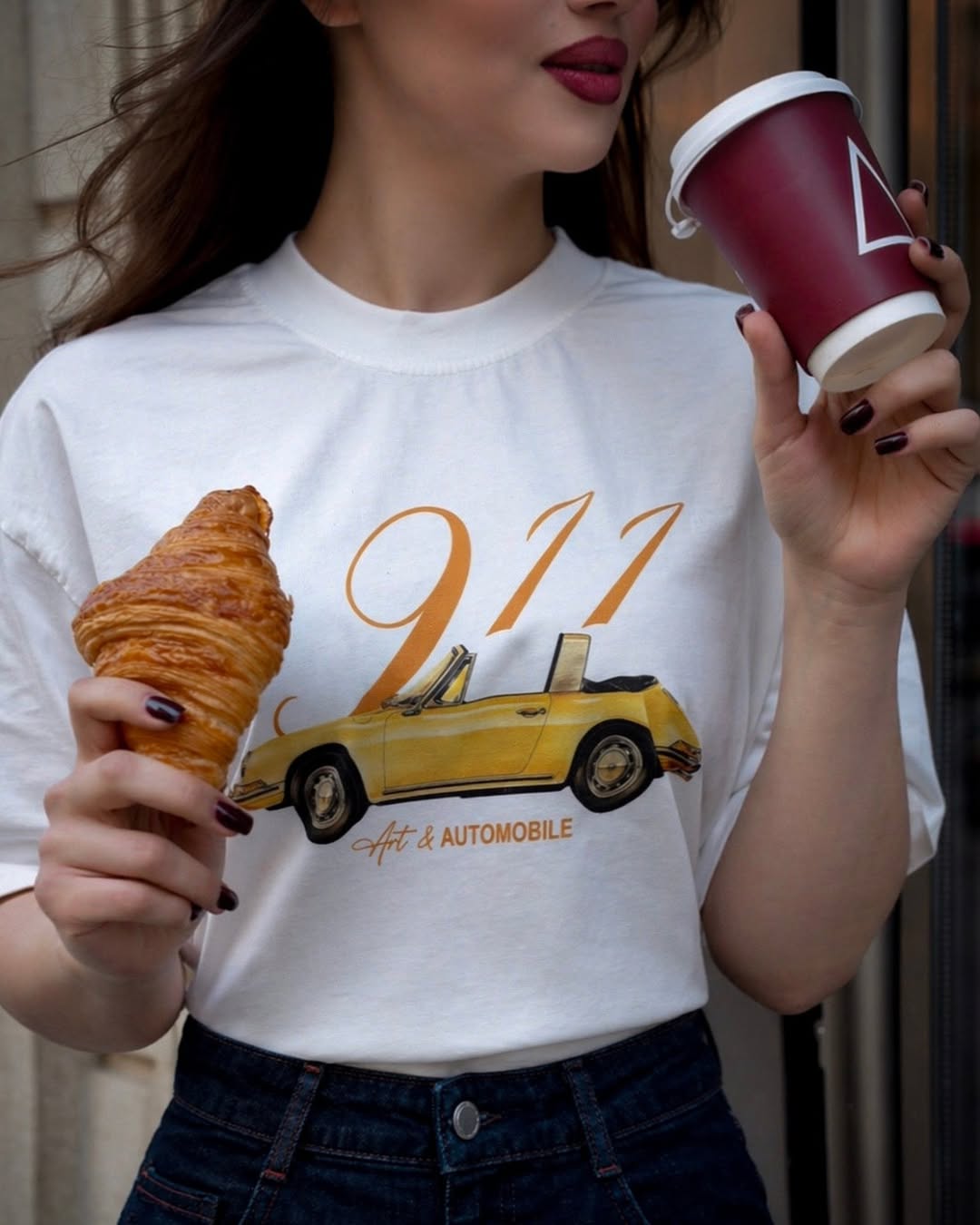 Almond croissant with a Korhan coffee cup