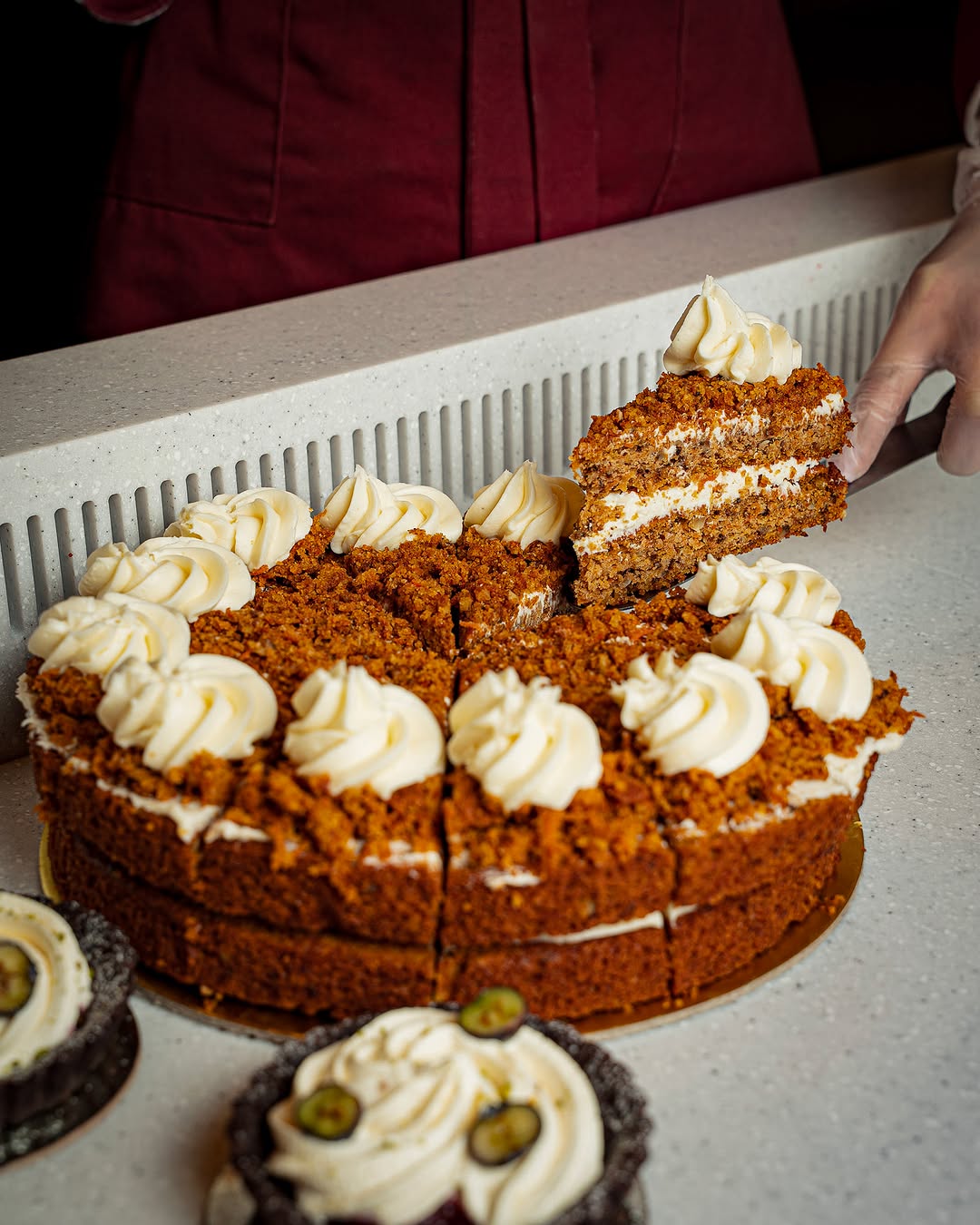 Carrot cake with cream cheese piping